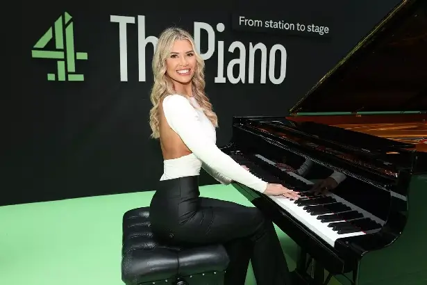 Christine McGuinness looked stunning as she wore a backless white blouse, matching it with black leather trousers and a pair of black pumps.