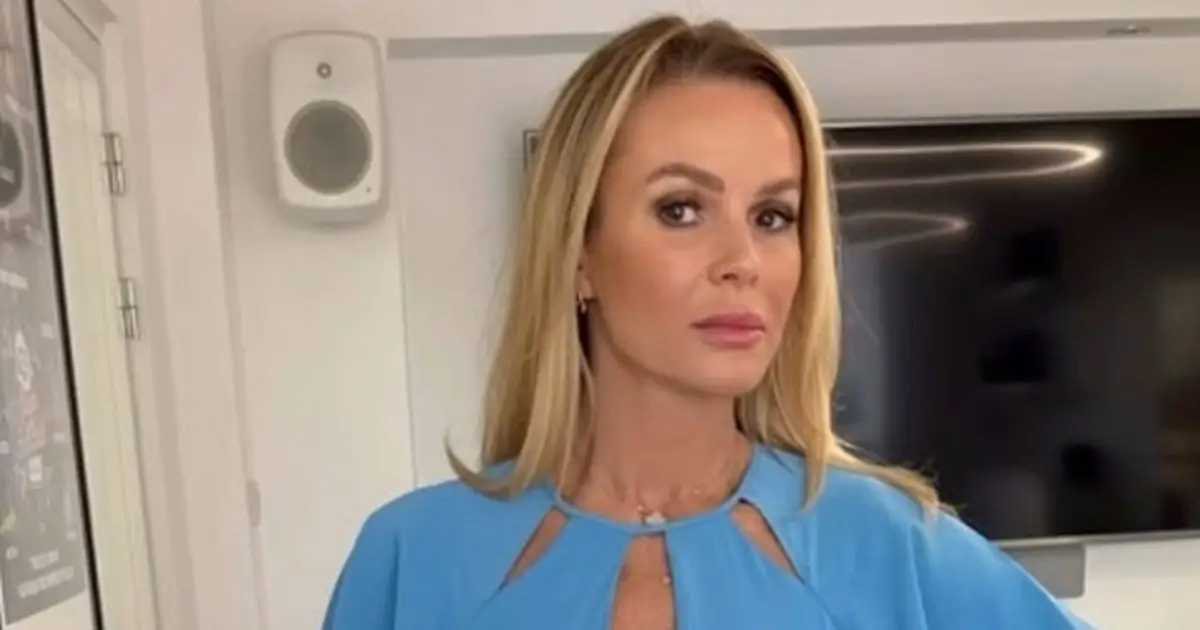 Braless Amanda Holden almost caused an internet meltdown as she stepped out in a skintight blue frock