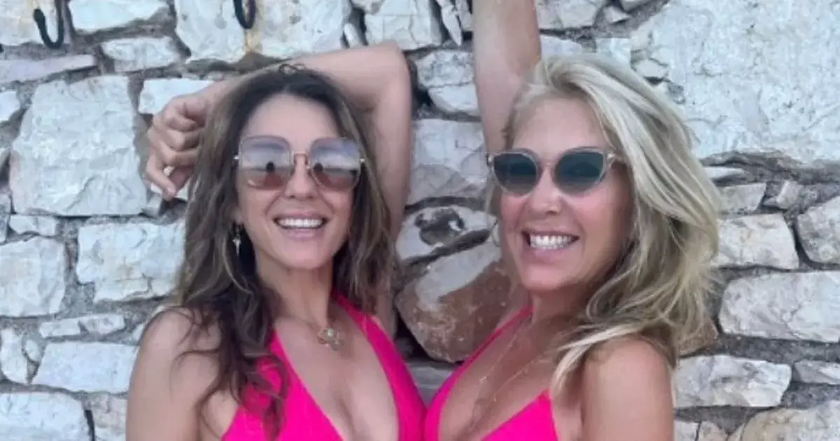 Elizabeth Hurley, 58, bares all in teeny bikinis as she wishes ‘sister’ happy birthday