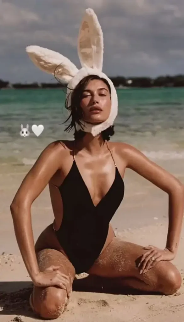 Earlier this month, a series of snaps of Hailey left little to the imagination, sporting oversized bunny ears and strolling on the beach in a revealing outfit.