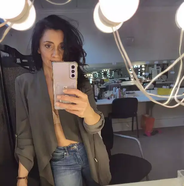 ITV soap star Rebecca Sarker posed up a storm in a tiny bra and jeans in her dressing room.