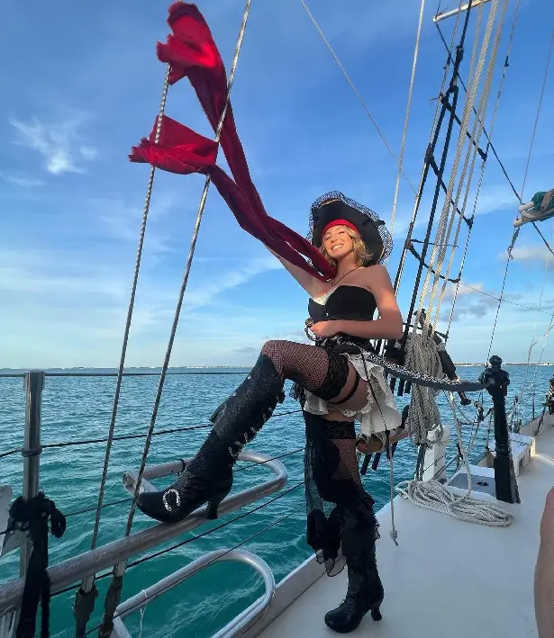 On a boat with friends, Sydney Sweeney wore a tiny pirate costume complete with stockings that caught the attention of her fans.