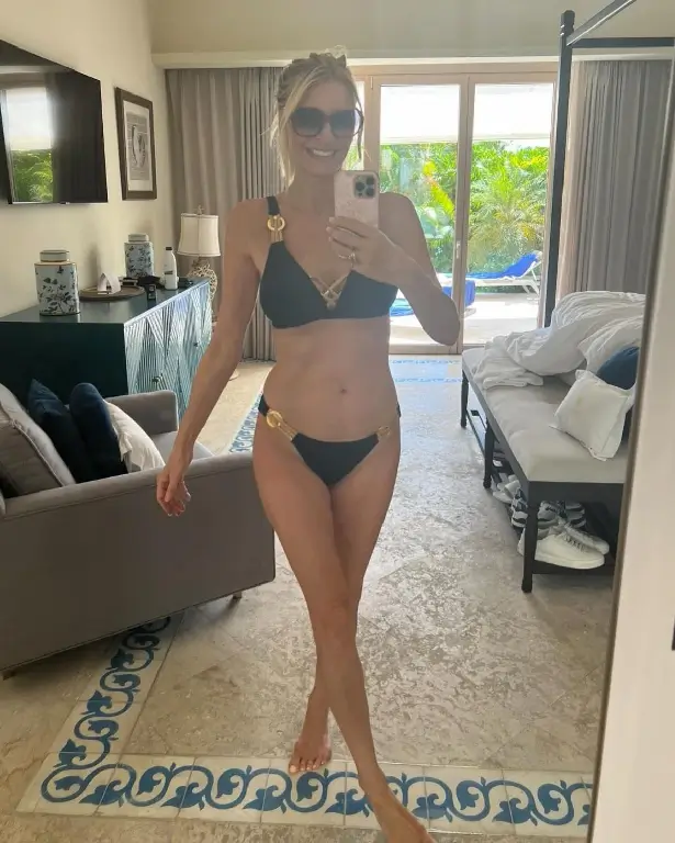 In an array of sunny selfies, Tess Daly demonstrated her lithe figure in a series of microscopic bikinis .