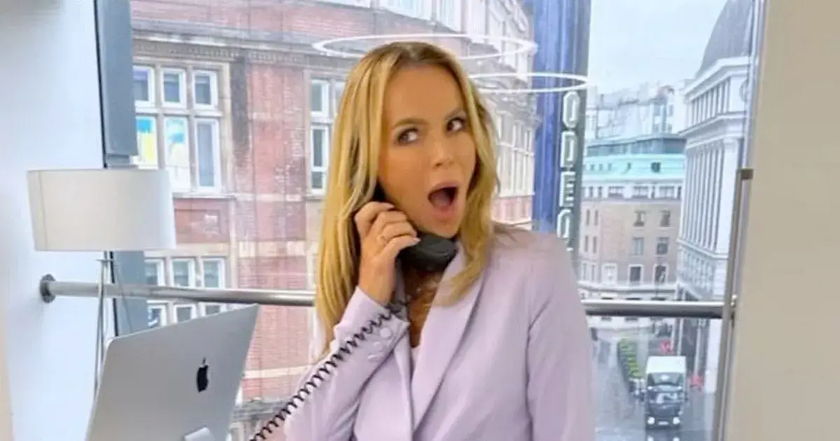 Amanda Holden, 53, ditches bra under tiny silk top as she tugs on delicate metal straps