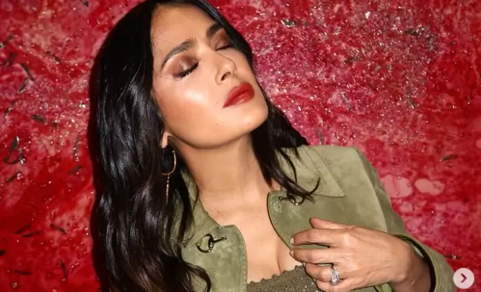 In a green suede co-ord with a mesh top, Salma Hayek captured the attention of the crowd at the Gucci dinner in London