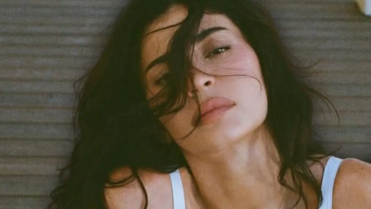 Kylie Jenner showed off her bust in a white bra top as part of her ‘poplin’ summer collection