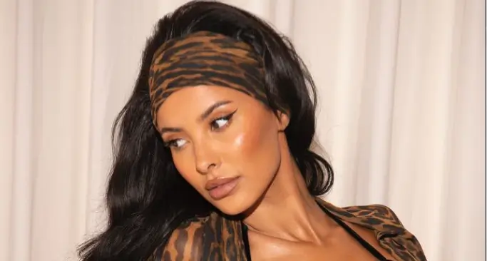 Maya Jama looked stunning as she stripped to a bra top and leopard-print jacket for a lavish London party