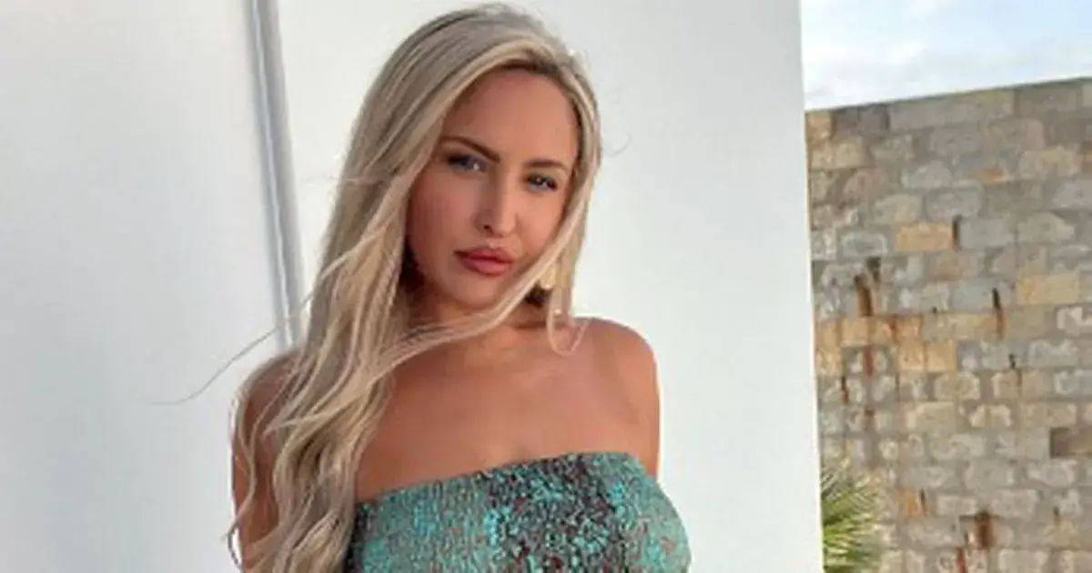 In a two-piece green dress while on holiday, stunning Emma Jones gave football fans a Marilyn Monroe moment In a two-piece green dress while on holiday, stunning Emma Jones gave football fans a Marilyn Monroe moment