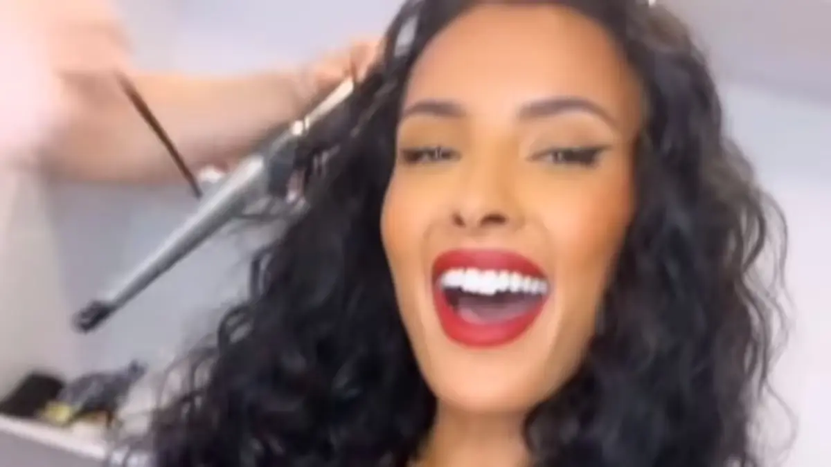 Maya Jama, 30, shows off her gorgeous figure in a low-cut black mini dress on her return to Love Island Aftersun hosting duties