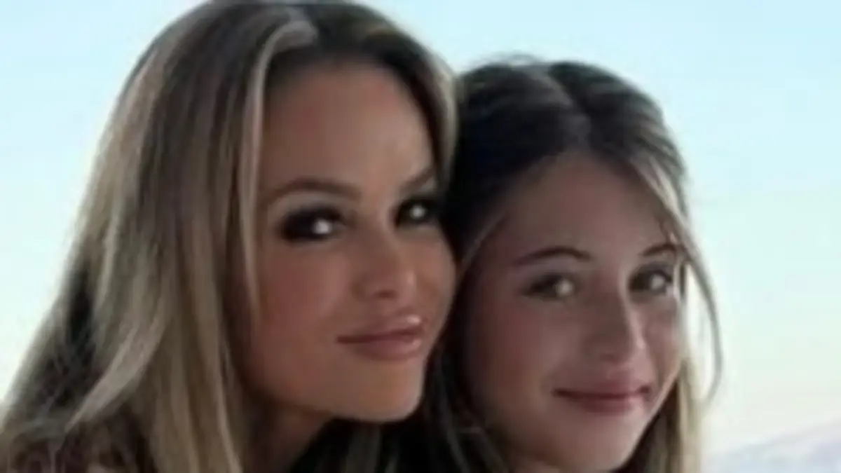 Amanda Holden, 54, looks gorgeous in a boho summer dress as she unwinds in Greece with Lex and Hollie, who look alike