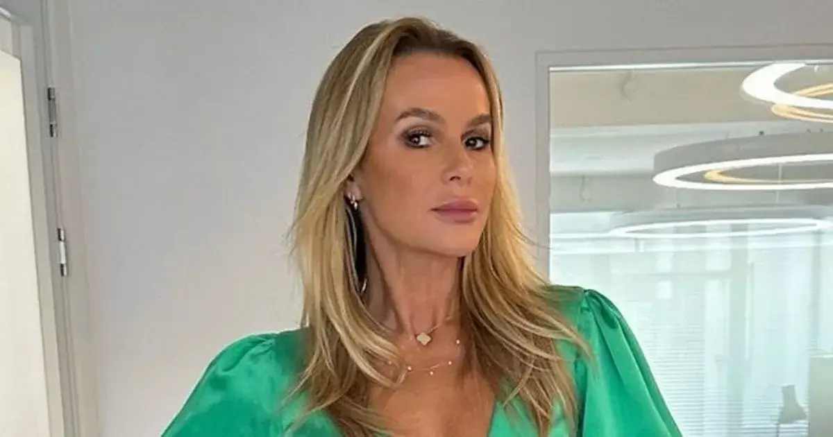 Amanda Holden exposed her cleavage in a cut-out jumpsuit as she hides ‘breakfast tummy’