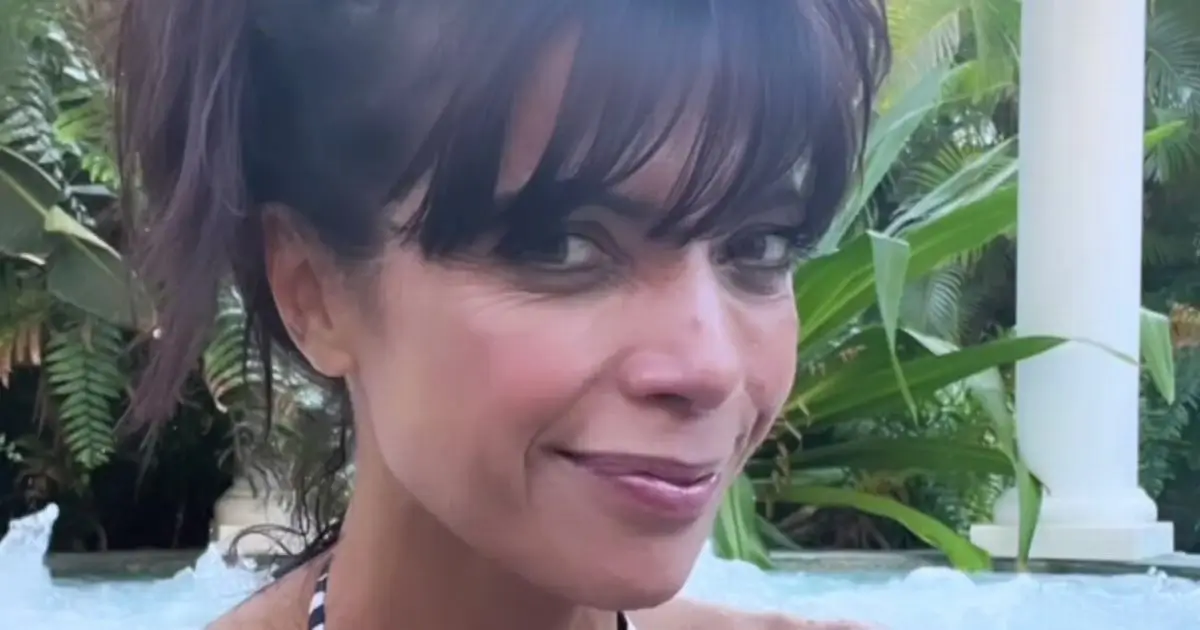 Jenny Powell, 56, shows off her ageless physique in a tiny bold zebra print swimsuit as she soaked up the sun