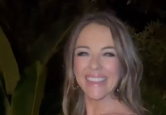 Elizabeth Hurley, 59, stunned her fans with a kiss and a plunging pink dress depicting her ageless figure
