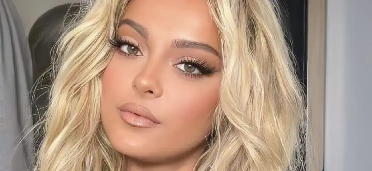 In a plunging blue swimsuit, Bebe Rexha showcased her sunkissed curves while oozing confidence, and she drove fans wild.