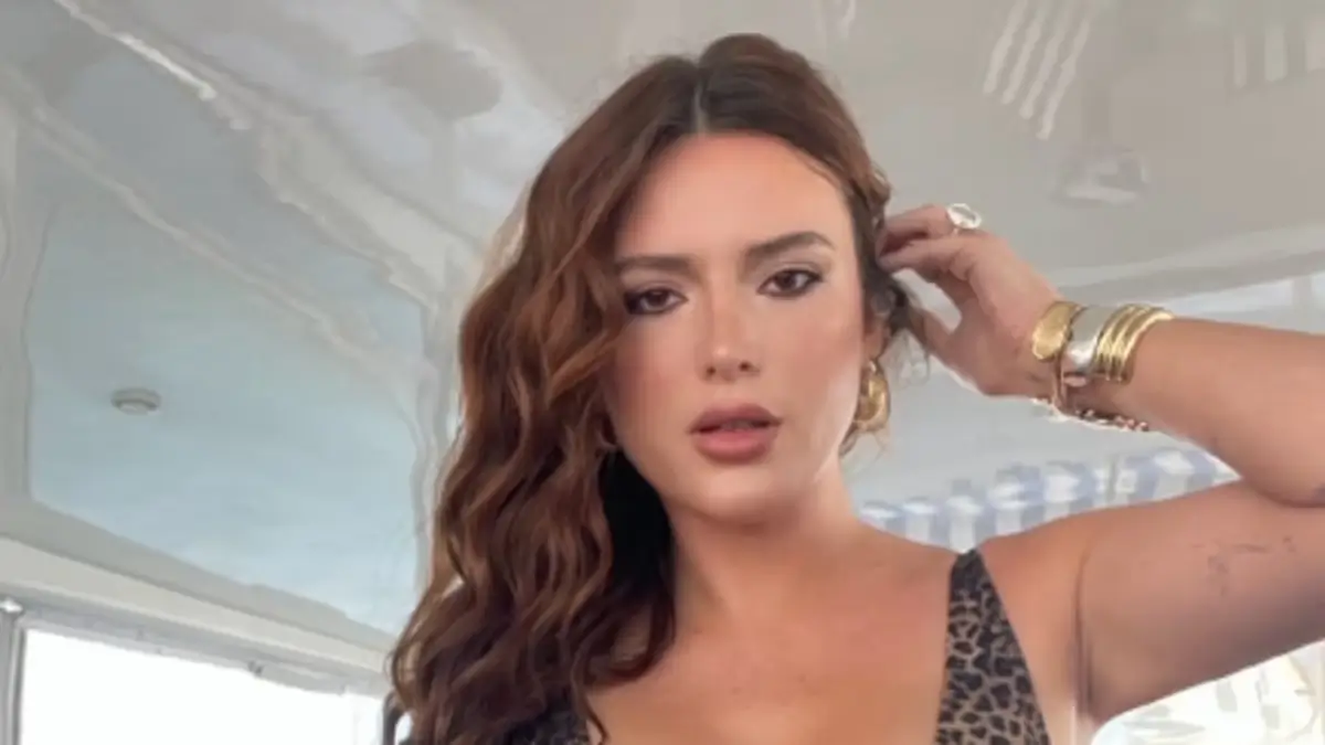 An animal-print swimsuit featured a plunging neckline that exposed Bella Thorne’s curves to celebrate ‘Hispanic Heritage Month’