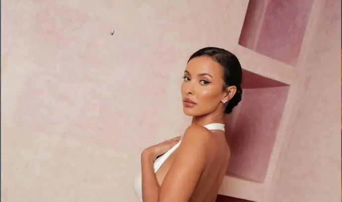 A backless white satin gown looks fabulous on Maya Jama as she attends a glam fashion event in Marrakech