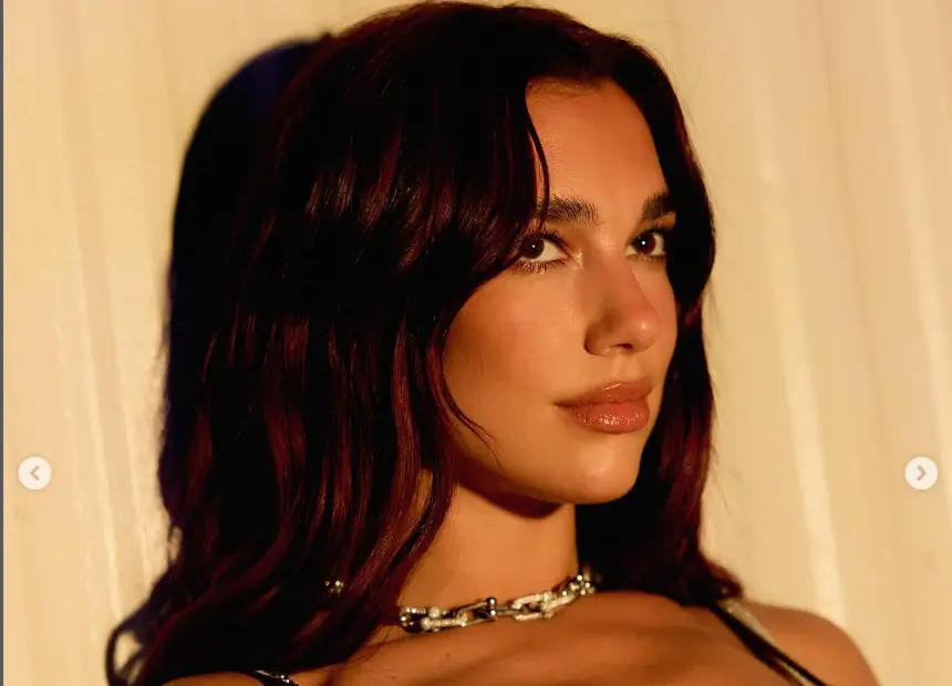 In burgundy shorts and crop top combination with a knee-high boots, Dua Lipa dazzles on stage at Austin City Limits Music Festival