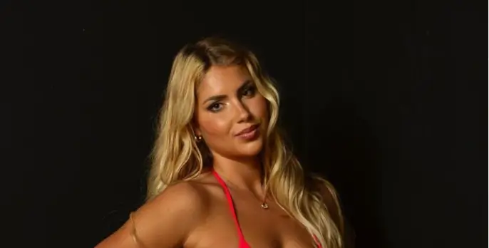 Andreea Dragoi Basking In The Sun In A Striking Red Swimsuit Looks ‘Splendid’