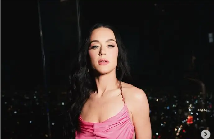 Braless Katy Perry showed off her amazing weight loss while modeling the skimpiest pink two-piece