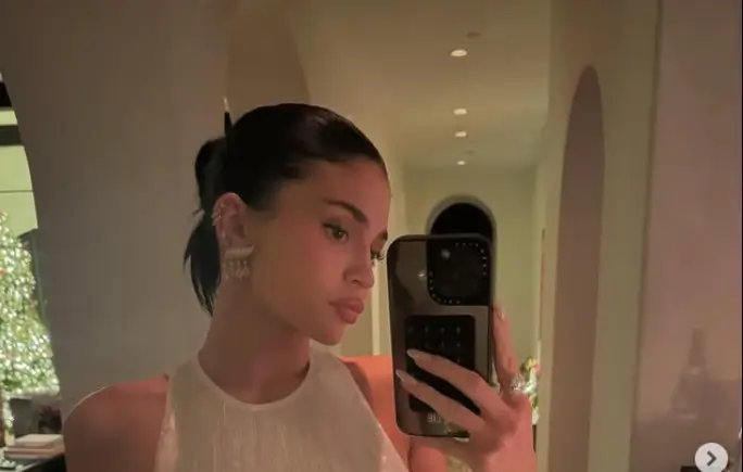 All eyes were on Kylie Jenner in her stunning white sequin halter gown  at intimate family Christmas celebration