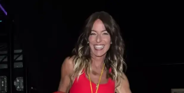 Davina McCall flaunted her amazing physique in a tiny shorts and tank top, channeled her inner Baywatch