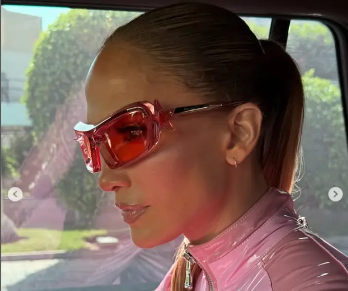 Jennifer Lopez looked stunning and youthful as she showed off her well-toned body in a stunning pink leather catsuit