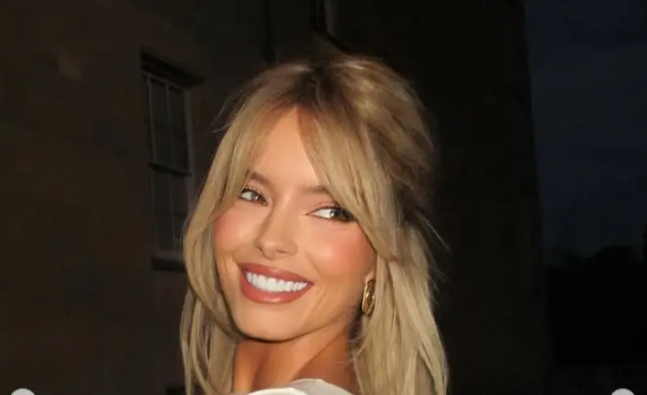 Maura Higgins is turning heads in a stunning white backless gown that perfectly showcases her physique