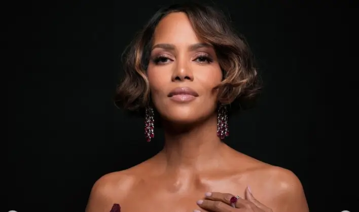 Halle Berry showcases her timeless elegance and style with her stunning burgundy satin dress!