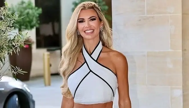 Christine McGuinness stunned in a ruffled mini skirt paired with a matching crop top highlighted her fabulous legs