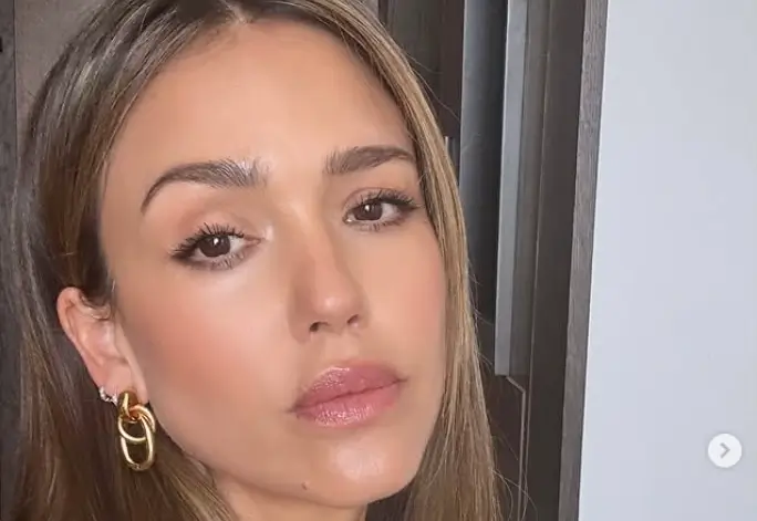 Jessica Alba sizzles in a minuscule, black bikini snaps as she posed elegantly in a rooftop pool