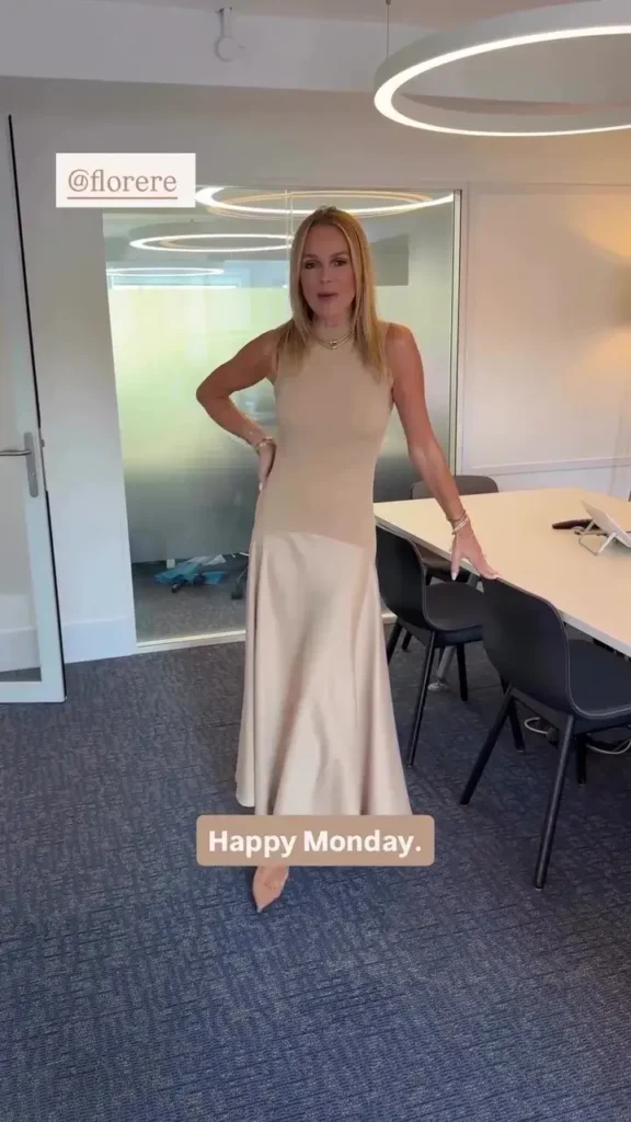 She looked stunning in the dress that hugged her body and showed off her great contours. The chic satin-bottomed dress fit her toned body perfectly, and she wore killer Louboutin shoes to match.